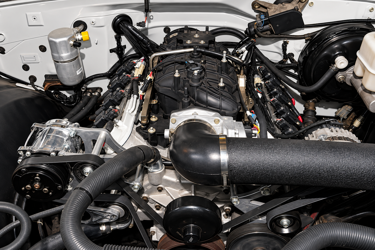 Modern engine installed in a classic vehicle at Tacot Garage